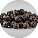 Black peppercorns in a pile